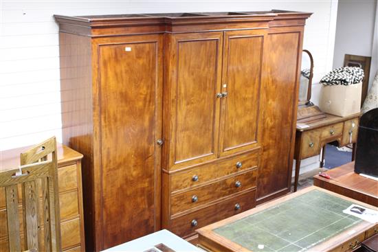 A Victorian mahogany breakfront wardrobe, W.288cm D.65cm H.230cm